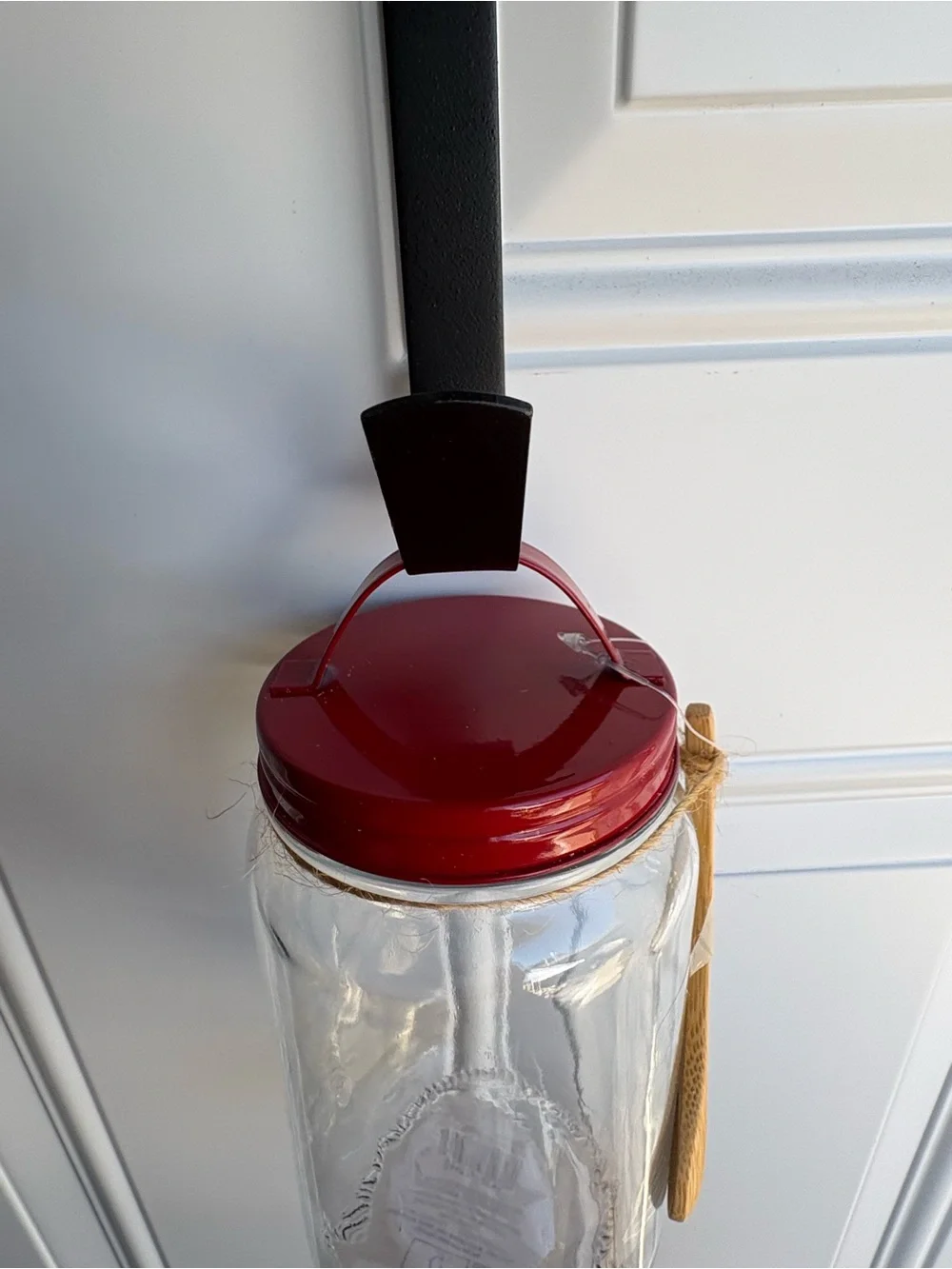 Set of 4 glass storage jars with wooden spoon form Target Bullseye